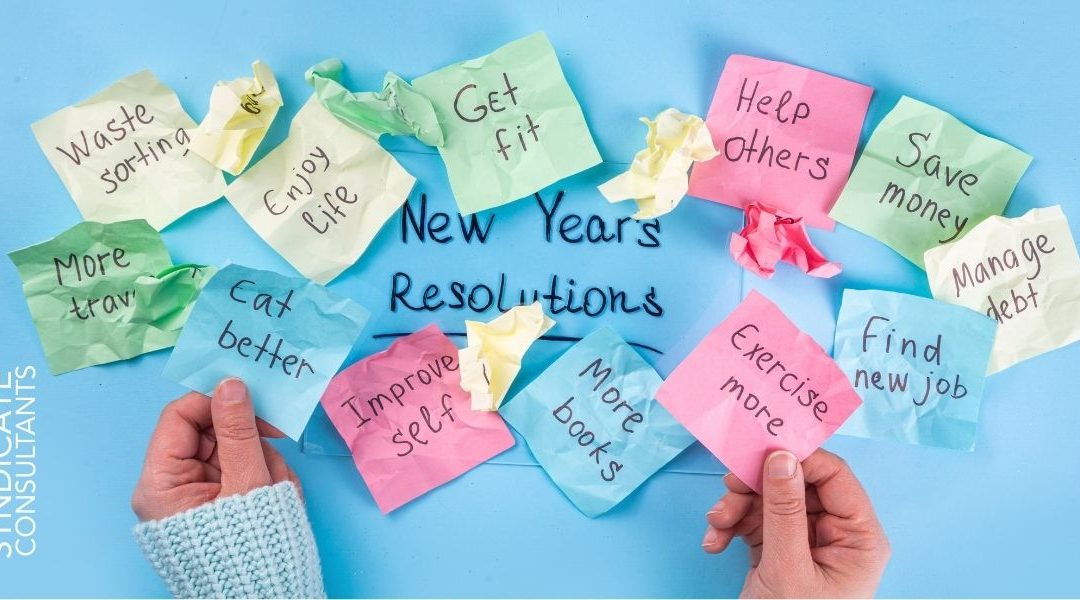 small pieces of paper with new years resolutions